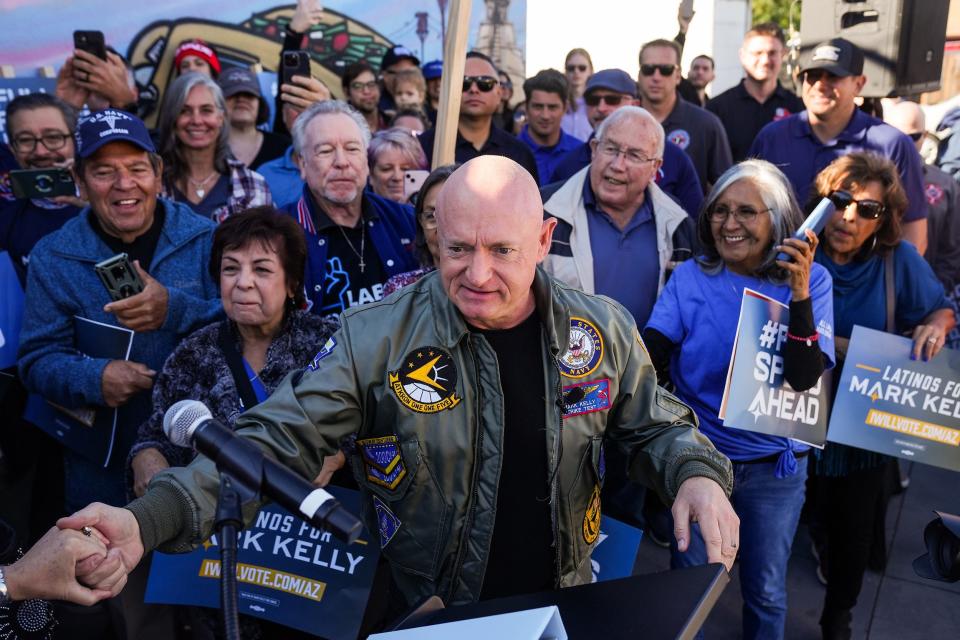 Sen. Mark Kelly greets attendees before giving his victory speech at Barrio Cafe on Saturday, Nov. 12, 2022, in Phoenix. Kelly beat Blake Masters, GOP candidate, to secure his reelection.