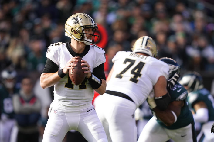 New Orleans Saints quarterback Andy Dalton (14) drops back to pass in the first half of an NFL football game against the Philadelphia Eagles in Philadelphia, Sunday, Jan. 1, 2023. (AP Photo/Matt Rourke)