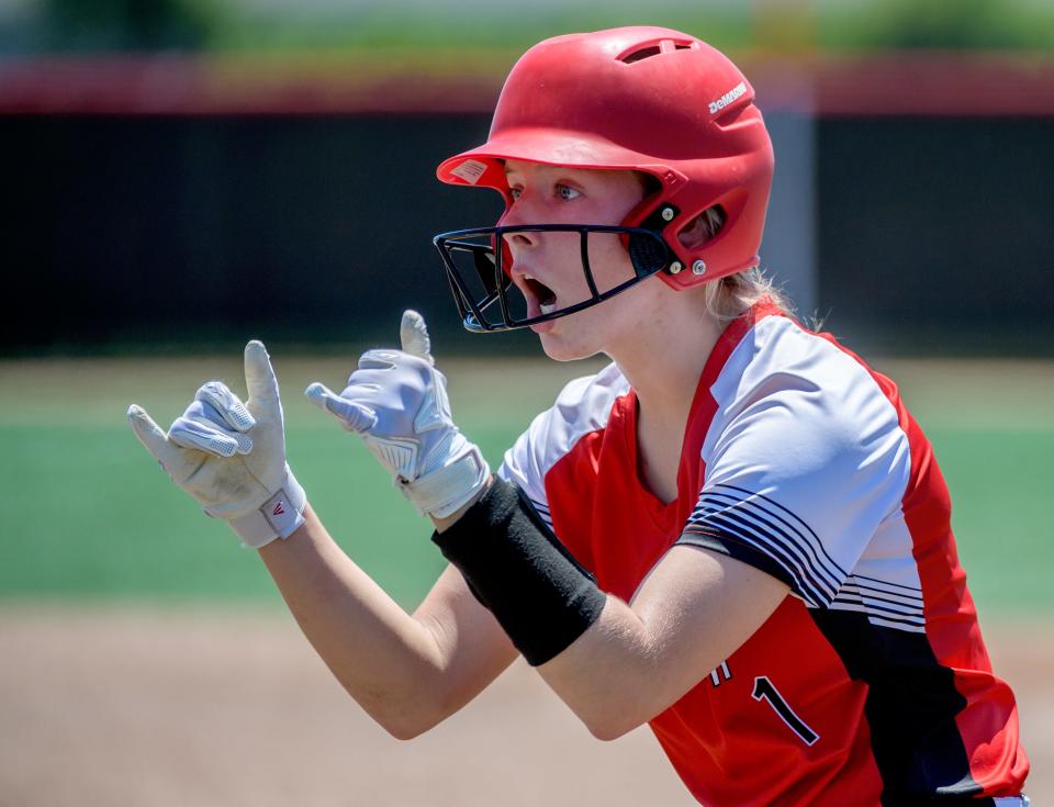 Forreston's Rylee Broushous signals to her teammates after outrunning a Casey-Westerfield throw to first base in the sixth inning of their Class 1A state softball semifinal Friday, June 3, 2022 at the Louisville Slugger complex in Peoria. Forreston fell 4-0.