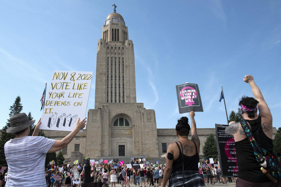 FILE - Protesters line the street around the front of the Nebraska Capitol during an Abortion Rights Rally, July 4, 2022, in Lincoln, Neb. Nebraska Sen. Merv Riepe, the state lawmaker who tanked an effort in 2023 by his fellow Republicans to pass a near-total abortion ban, has given top priority this year to a bill that would allow abortions beyond the state's 12-week ban in cases of fatal fetal anomalies. (Kenneth Ferriera/Lincoln Journal Star via AP, File)