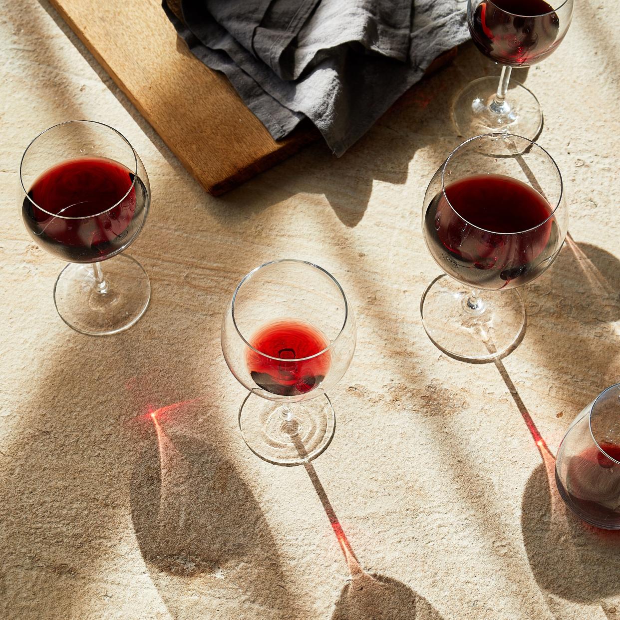 red wines in glasses on table