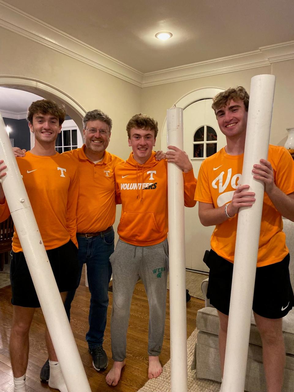 Zach Vickers, Ned Vickers, Ben Vickers and Eli Vickers post with pieces of a field-goal post from Neyland Stadium from Tennessee football's win against Alabama on Oct. 15, 2022.