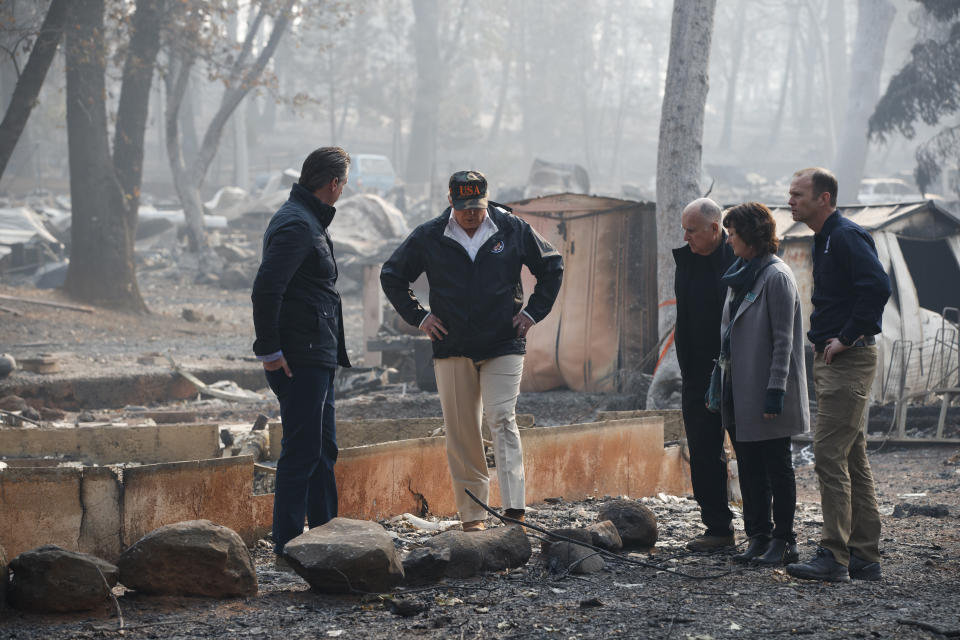 President Trump visits a neighborhood hit by wildfires on Nov. 17, 2018, in Paradise, Calif. (Photo: Evan Vucci/AP)