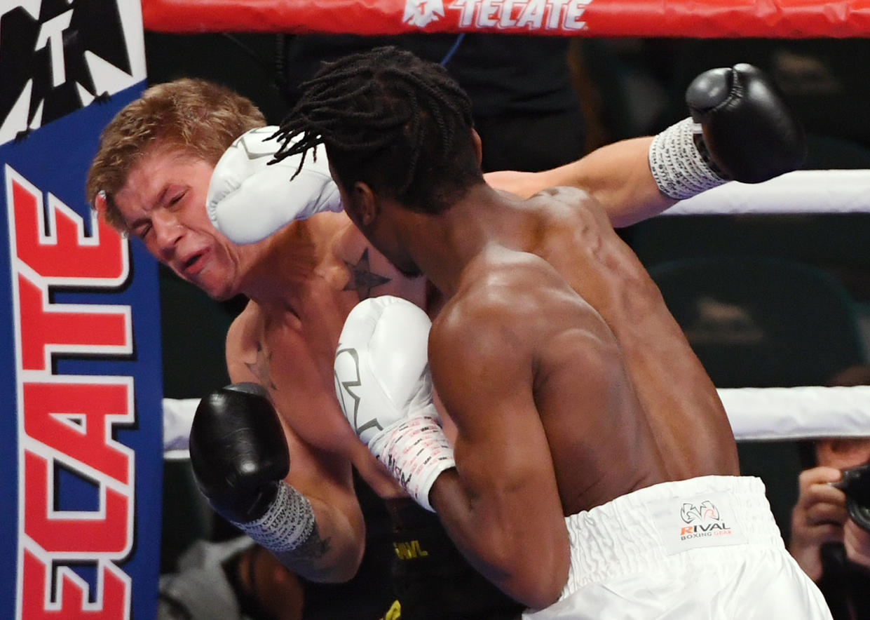 LAS VEGAS, NEVADA - NOVEMBER 02:  Evan Holyfield (R) hits Nick Winstead in the first round of their super welterweight bout at MGM Grand Garden Arena on November 2, 2019 in Las Vegas, Nevada. Holyfield won his debut fight by first-round TKO.  (Photo by Ethan Miller/Getty Images)