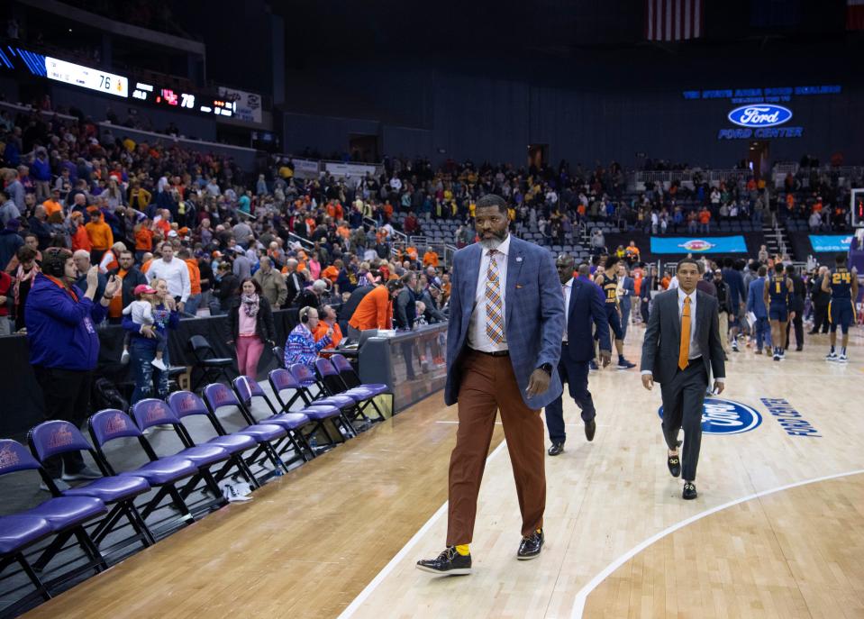 Walter McCarty leaves the court for the last time as Evansville coach after defeating Murray State at Ford Center in Evansville, Ind. on Dec. 21, 2019.