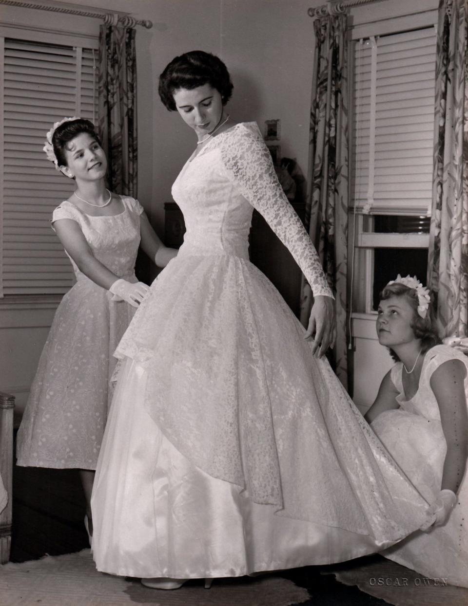 Anna poses with her bridesmaids in the dresses she handmade for the three of them for her 1956 wedding.