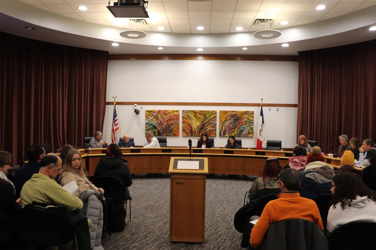 Members of the community packed council chambers ahead the Coralville city council meeting on Tuesday, Jan. 16, 2024. The council passed a resolution supporting peace in Gaza and Israel on Tuesday night.