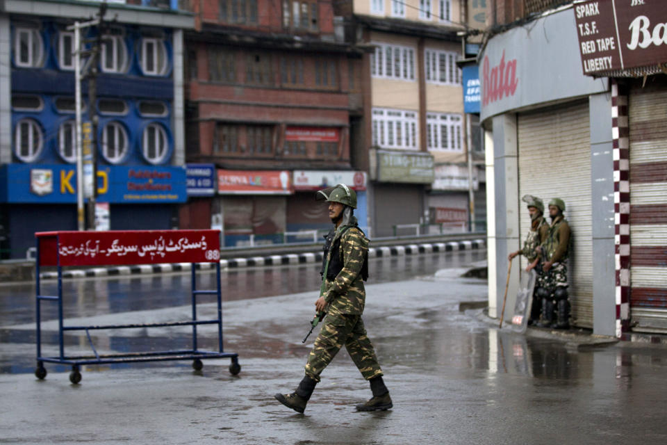 Indian paramilitary soldiers patrol during security lockdown in Srinagar, Indian controlled Kashmir, Wednesday, Aug. 14, 2019. India has maintained an unprecedented security lockdown to try to stave off a violent reaction to Kashmir's downgraded status. Protests and clashes have occurred daily, thought the curfew and communications blackout have meant the reaction is largely subdued. (AP Photo/ Dar Yasin)