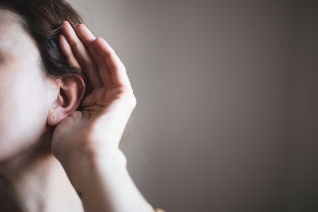 Not being able to hear clearly is what's commonly associated with hearing loss, but there are less obvious signs that you should get your hearing checked, too. (Photo: Photographer, Basak Gurbuz Derman via Getty Images)