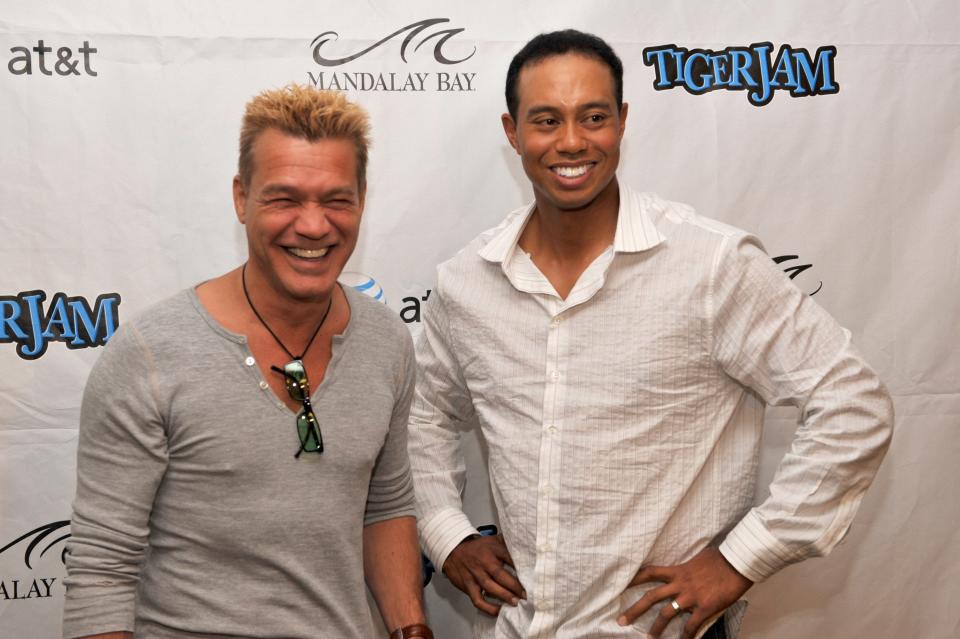 LAS VEGAS - APRIL 19:  Eddie Van Halen and Tiger Woods arrive at the 11th Annual Tiger Jam at Mandalay Bay Resort & Casino on April 19, 2008 in Las Vegas, Nevada.  (Photo by Lester Cohen/WireImage)