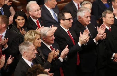 U.S. President Donald Trump addresses Joint Session of Congress - Washington, U.S. - 28/02/17 - Cabinet members applaud as U.S. President Donald Trump addresses the U.S. Congress. REUTERS/Kevin Lamarque