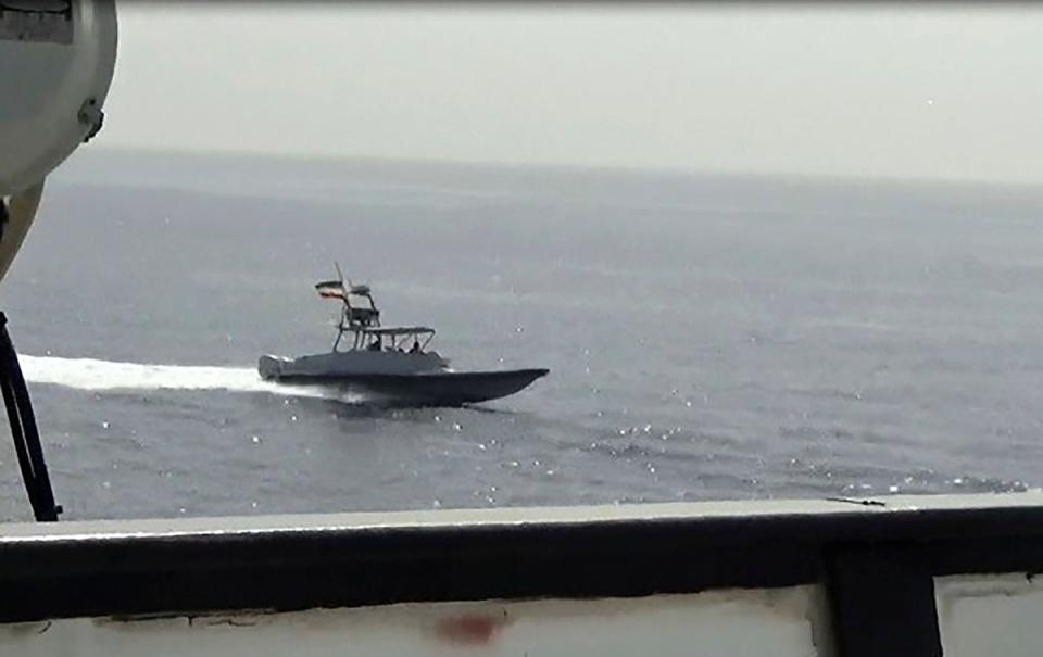 Ships from the Iranian Revolutionary Guard come into close contact with two US Naval ships in the Strait of Hormuz (US Navy via Associated Press)