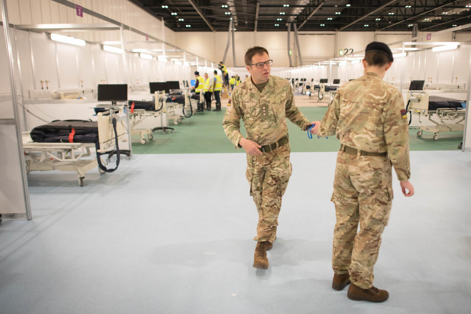 Military personnel at the ExCel centre in London which is being made into a temporary hospital - the NHS Nightingale hospital, comprising of two wards, each of 2,000 people, to help tackle coronavirus.