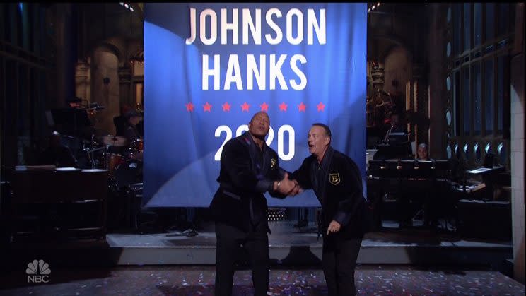 Johnson and Tom Hanks jokingly 'announce' their presidential run on Saturday Night Live, May 2017 (Credit: NBC/WENN.com)