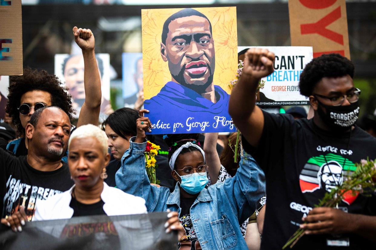 <p>Michael Cooper was arrested at the George Floyd protest despite being a part of CNN’s press team </p> (AFP via Getty Images)