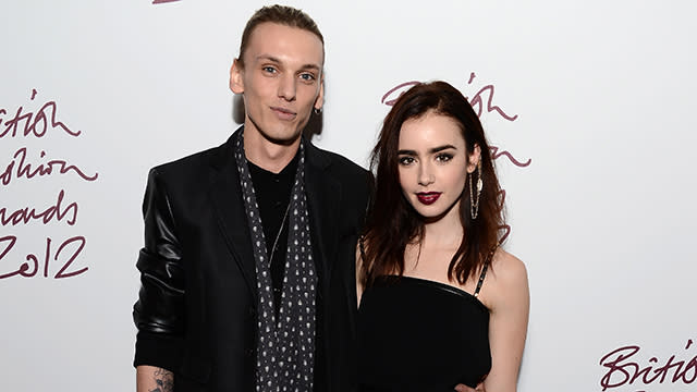 Looks like Lily Collins' reported romance with <em>Captain America</em> star Chris Evans didn't last very long. The 26-year-old actress confirmed it's back on between her and British actor Jamie Campbell Bower on Wednesday, by sharing two super-sweet snapshots of the two of them flaunting their PDA on Instagram. "Happy is what happy does. 50 shades of blush #cloud9ispinkright?...," Lily wrote alongside a pic of Jamie kissing her cheek. <strong>PHOTOS: The Most On-Again, Off-Again Couples in Hollywood</strong> An hour later, the <em>Mirror Mirror</em> star shared a pic of them smooching, gushing, "Life works in mysterious ways but when you find your inner glow is back and shining brighter, you know it's right..." Lily and Jamie met on the set of their 2013 film <em>The Mortal Instruments: City of Bones</em>, and started dating in 2012. They split in August 2013. Since their breakup, she was rumored to have dated Zac Efron, and most recently, the 33-year-old <em>Avengers: Age of Ultron</em> star. <strong>PHOTOS: Lily Collins' Never-Ending Crop Top Style</strong> ET caught up with Lily's reported ex, Chris, at the <em>Avengers: Age of Ultron</em> premiere last month, where he was adorably coy about all the dating rumors surrounding him and Lily! Watch below: