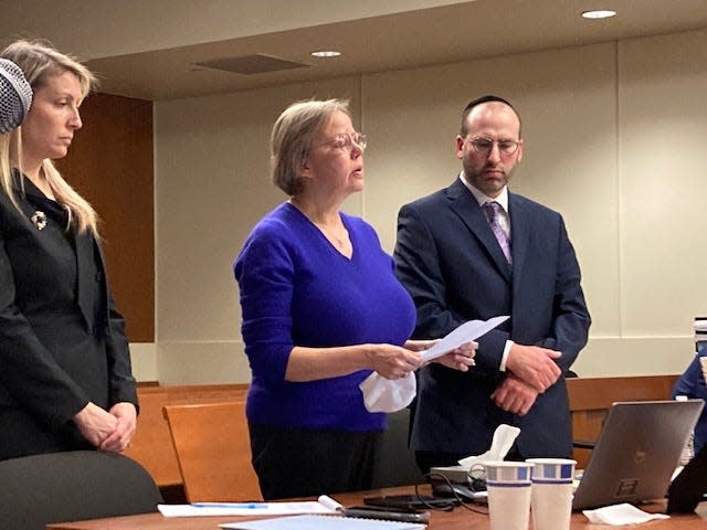 Assistant Prosecutor Lynne Seborowski stands next to Jennifer Byington, the mother of Carolyn Byington and Assistant Prosecutor Tzva Dolinger during the sentencing of Carolyn's co-worker Kenneth Saal during his sentencing in connection with her murder.