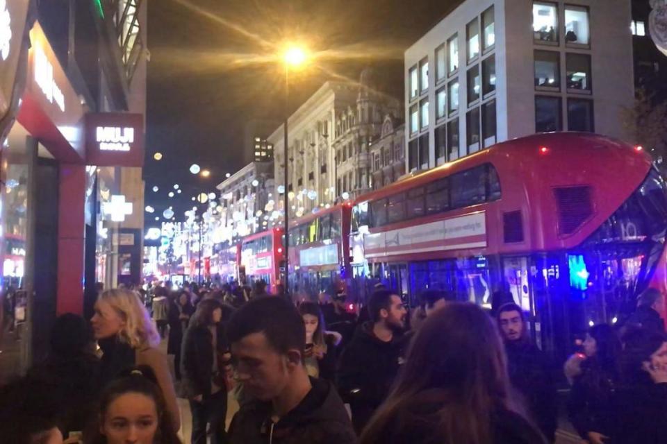 The scene in Oxford Street in London after police responded to a number of reports of shots being fired (PA)