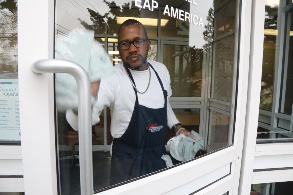 Cleaning the windows where he works as a janitor is Ralph Lee Jr. who was exonerated after spending 24 years in prison for being involved in a Paterson murder.