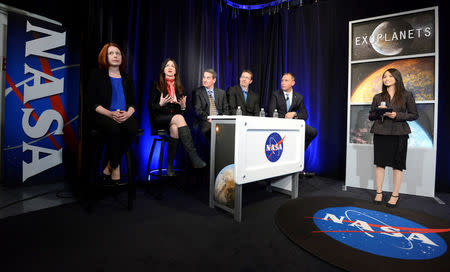 (L-R) Space Telescope Science Institute astronomer Nikole Lewis, MIT Professor of planetary science and physics Sara Seager, Sean Carey of NASA's Spitzer Science Center, University of Liege (Belgium) astronomer Michael Gillon and Associate Administrator for NASA's Science Mission Directorate Thomas Zurbuchen attend a news conference moderated by NASA Public Affairs Officer Felicia Chou, to present new findings on exoplanets, planets that orbit stars other than Earth's sun, in Washington, U.S., February 22, 2017. REUTERS/Mike Theiler