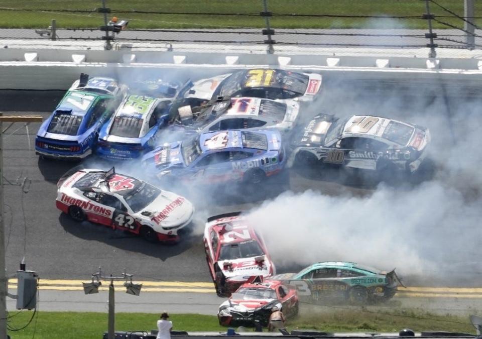 Austin Dillon (No. 3) picks his way through the mess and toward the lead after the major crash in Turns 1 and 2.