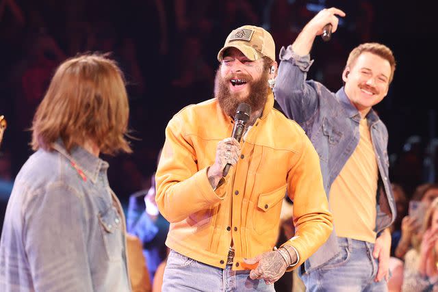 <p>Christopher Polk/Variety via Getty Images</p> HARDY, Post Malone and Morgan Wallen perform onstage at The 57th Annual CMA Awards at Bridgestone Arena in Nashville, Tennessee on Nov. 8, 2023