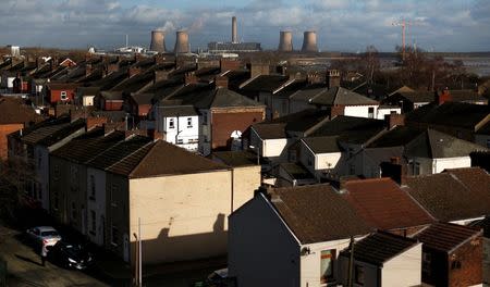 Fiddlers Ferry coal fired power station is seen as it rises above the rooftops of houses in Widnes in northern England, Britain February 3, 2016. REUTERS/Phil Noble