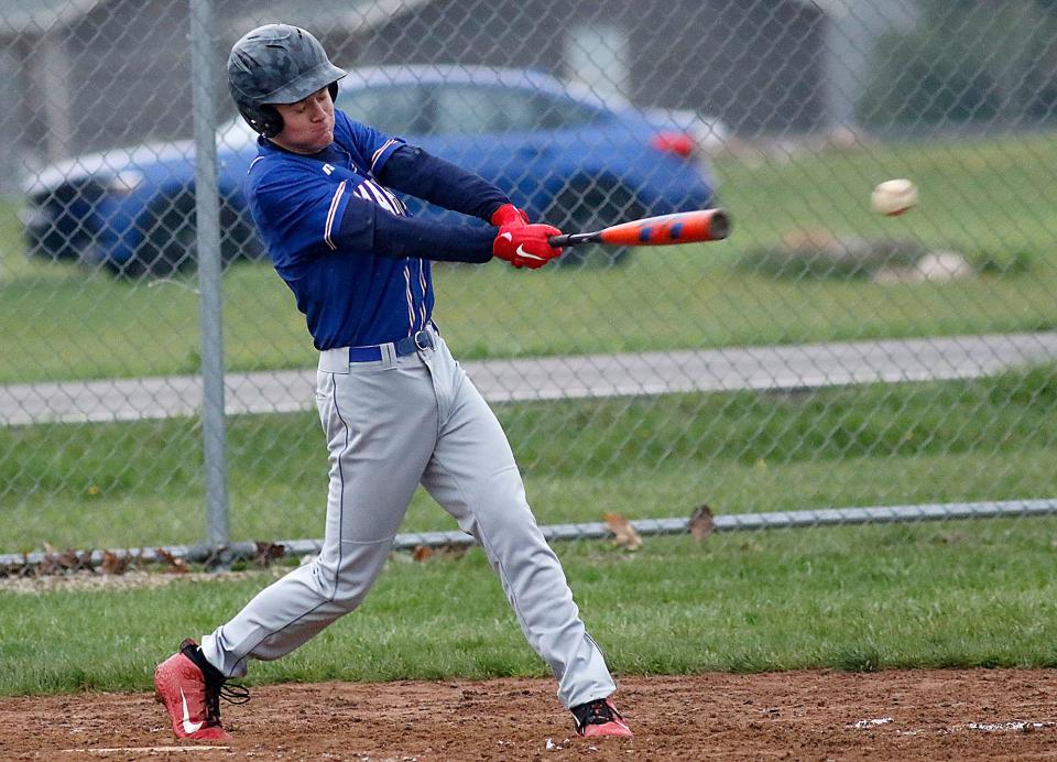 Mapleton High School's Evan Dennison (11) bats against New London during high school baseball action Monday, April 25, 2022 at Mapleton High School. TOM E. PUSKAR/TIMES-GAZETTE.COM