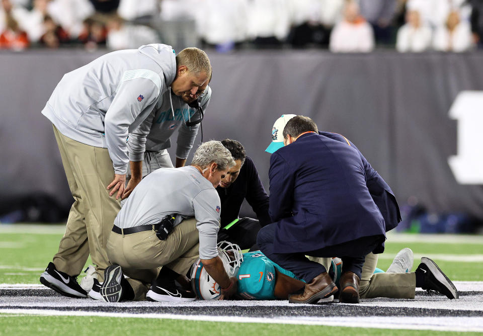 Medical staff tends to quarterback Tua Tagovailoa of the Miami Dolphins after an injury during a game against the Cincinnati Bengals at Paycor Stadium on Sept. 29, 2022, in Cincinnati, Ohio. / Credit: Getty Images