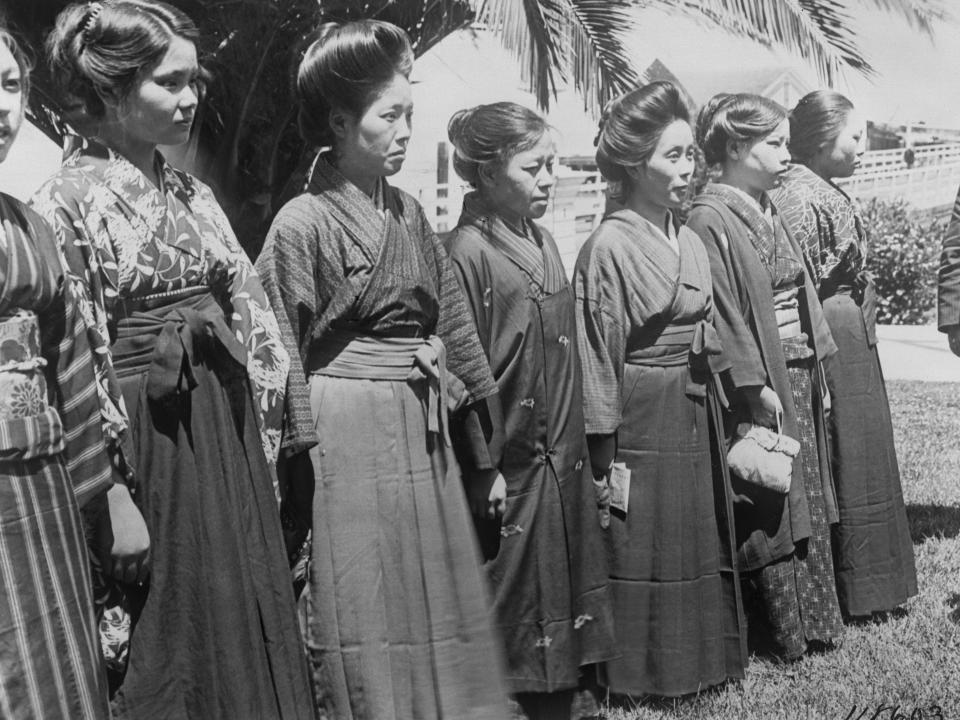 Japanese picture brides lined up at Angel Island in 1920.