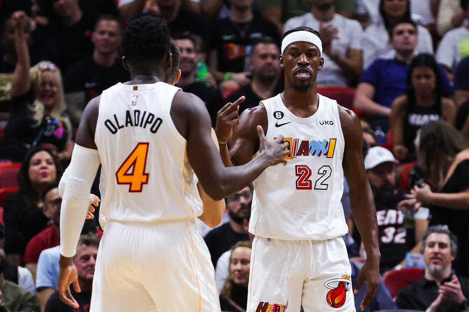 MIAMI, FLORIDA - DECEMBER 10: (EDITORS NOTE: Image contains profanity.) Jimmy Butler #22 of the Miami Heat (R) gestures during the first half of the game against the San Antonio Spurs at FTX Arena on December 10, 2022 in Miami, Florida. NOTE TO USER: User expressly acknowledges and agrees that, by downloading and or using this photograph, User is consenting to the terms and conditions of the Getty Images License Agreement. (Photo by Megan Briggs/Getty Images)