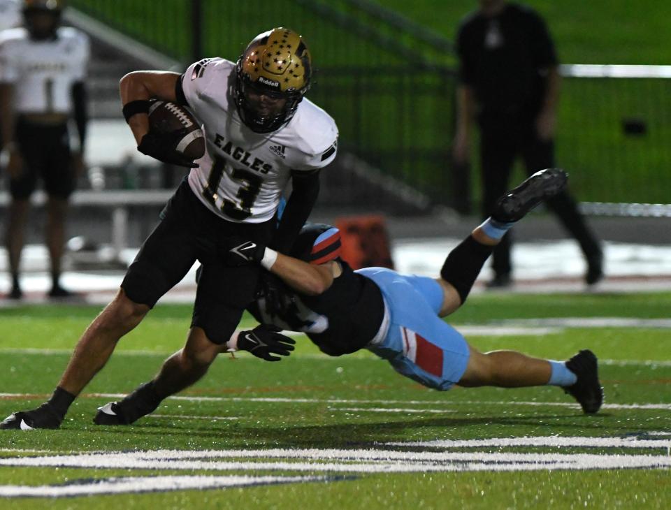 Abilene High's Jackson Howle runs with the ball against Lubbock Monterey in a District 2-5A Division I football game Friday at Lowrey Field in Lubbock.