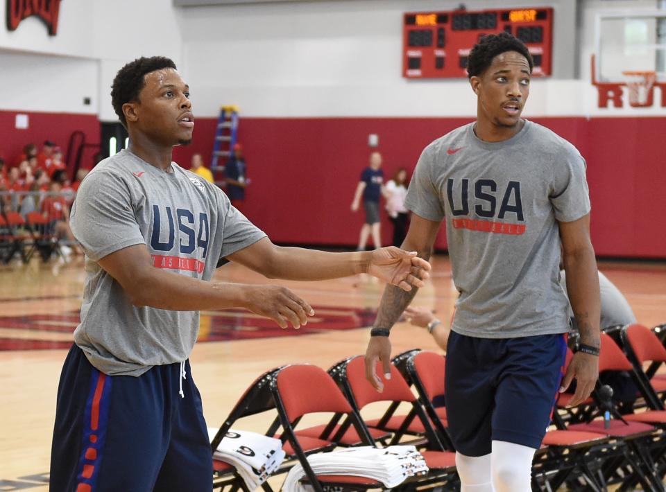 Raptors guards Kyle Lowry (left) and DeMar DeRozan are also teammates on Team USA. (Getty Images)