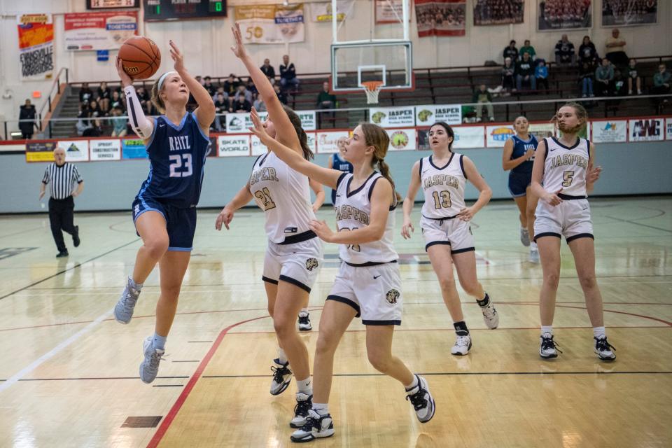 Reitz’s Norah Miller (23) drives to the net as the Reitz Panthers play the Jasper Wildcats during the semifinal round of the 2023 IHSAA Class 4A Girls Basketball Sectional at Harrison High School in Evansville, Ind., Friday, Feb. 3, 2023.