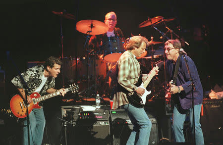 FILE PHOTO: American rock group The Eagles, shown performing in 1998 in London, Britain. REUTERS/David McNew/File Photo