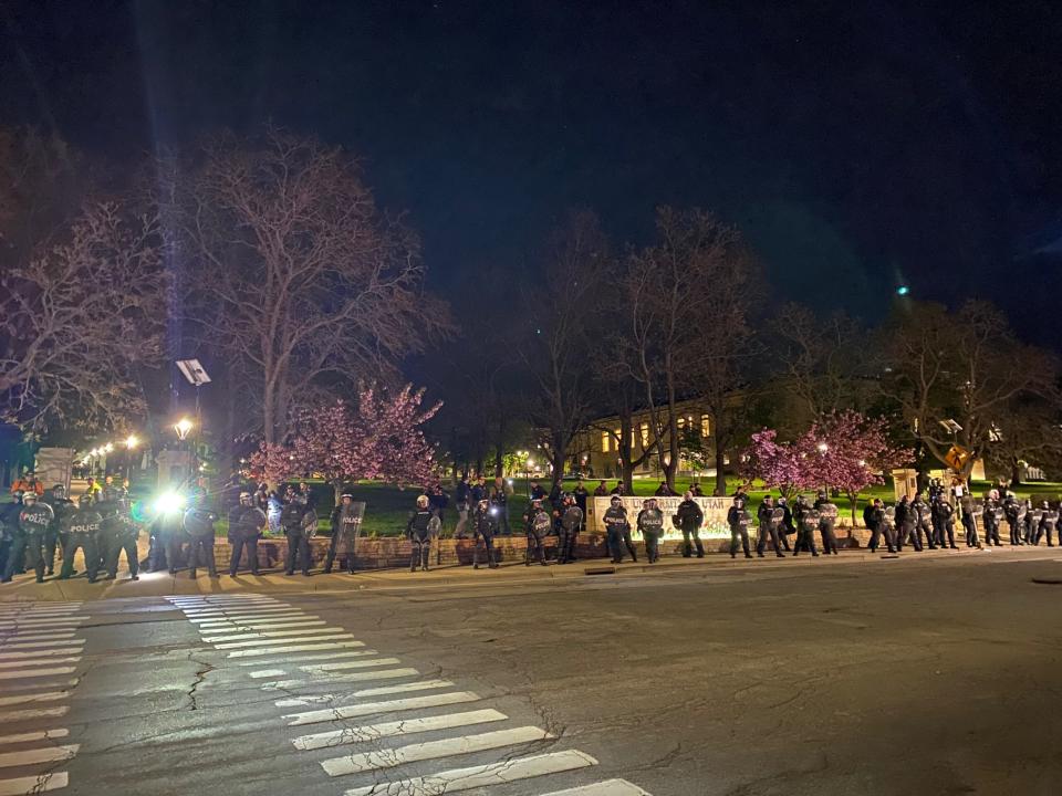 Police officers form a line after breaking up a pro-Palestine encampment at the University of Utah on Monday, April 29, 2024.