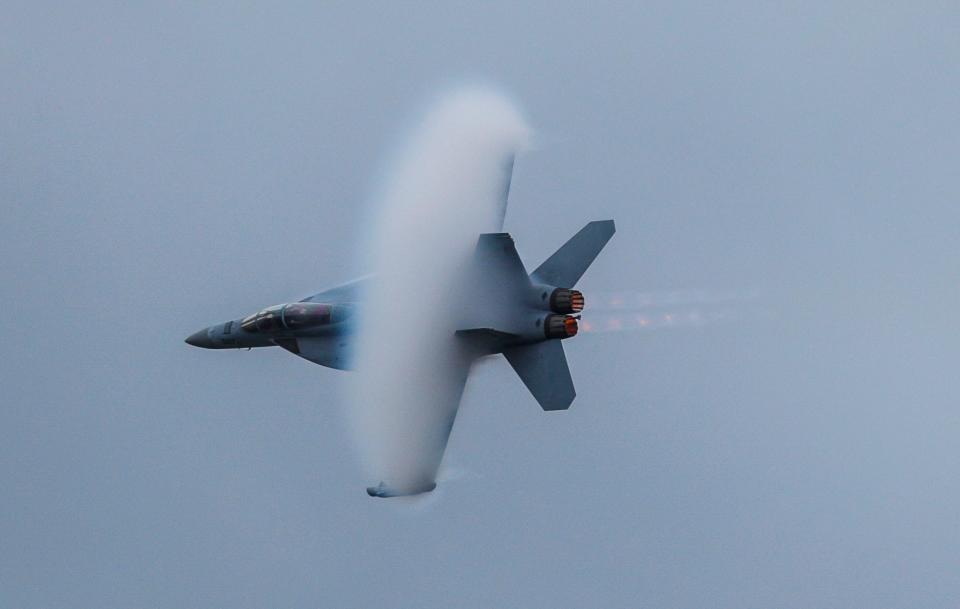 A fighter jet practices maneuvers Friday afternoon before Saturday's 2023 Thunder Over Louisville.