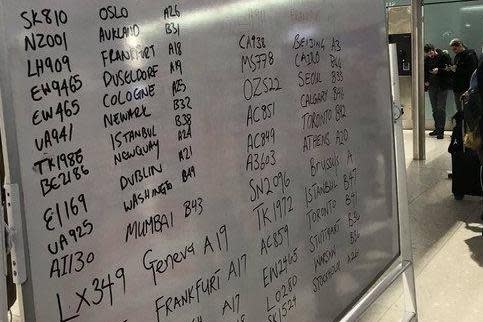 Gate check: departure information at Heathrow Terminal 2 was scrawled on whiteboards: Jenny Nielsen