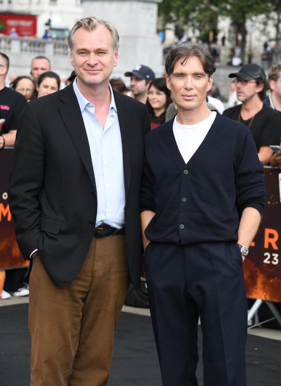 christopher nolan and cillian murphy standing shoulder to shoulder for a photo