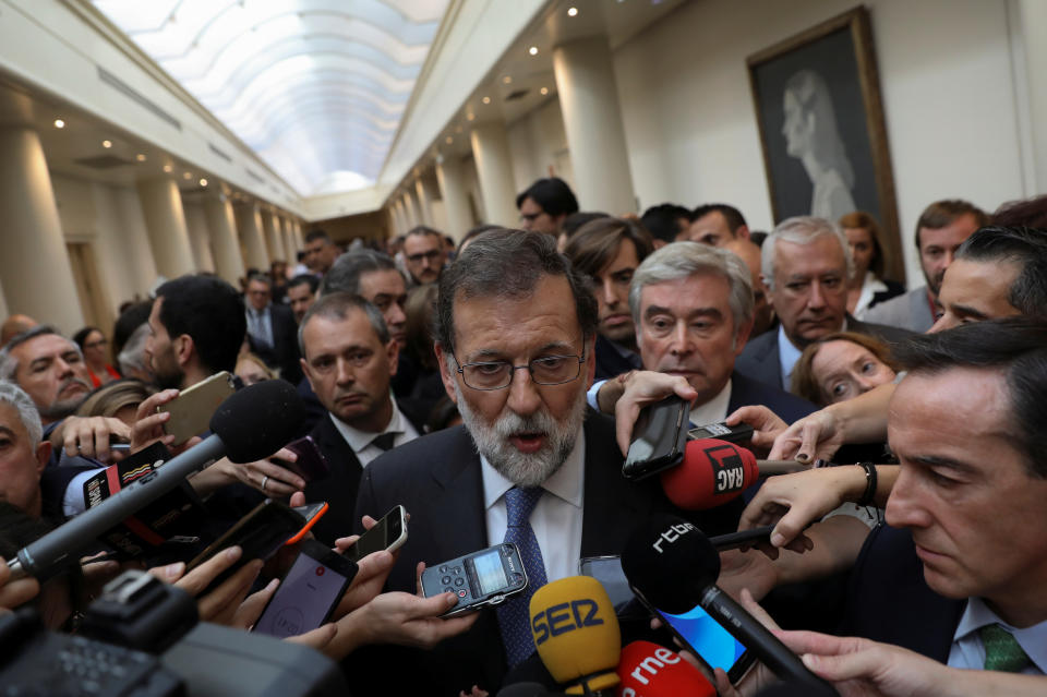 <p>Spain’s Prime Minister Mariano Rajoy talks to reportes after a plenary session at the upper house Senate in Madrid, Spain, Oct. 27, 2017. (Photo: Susana Vera/Reuters) </p>