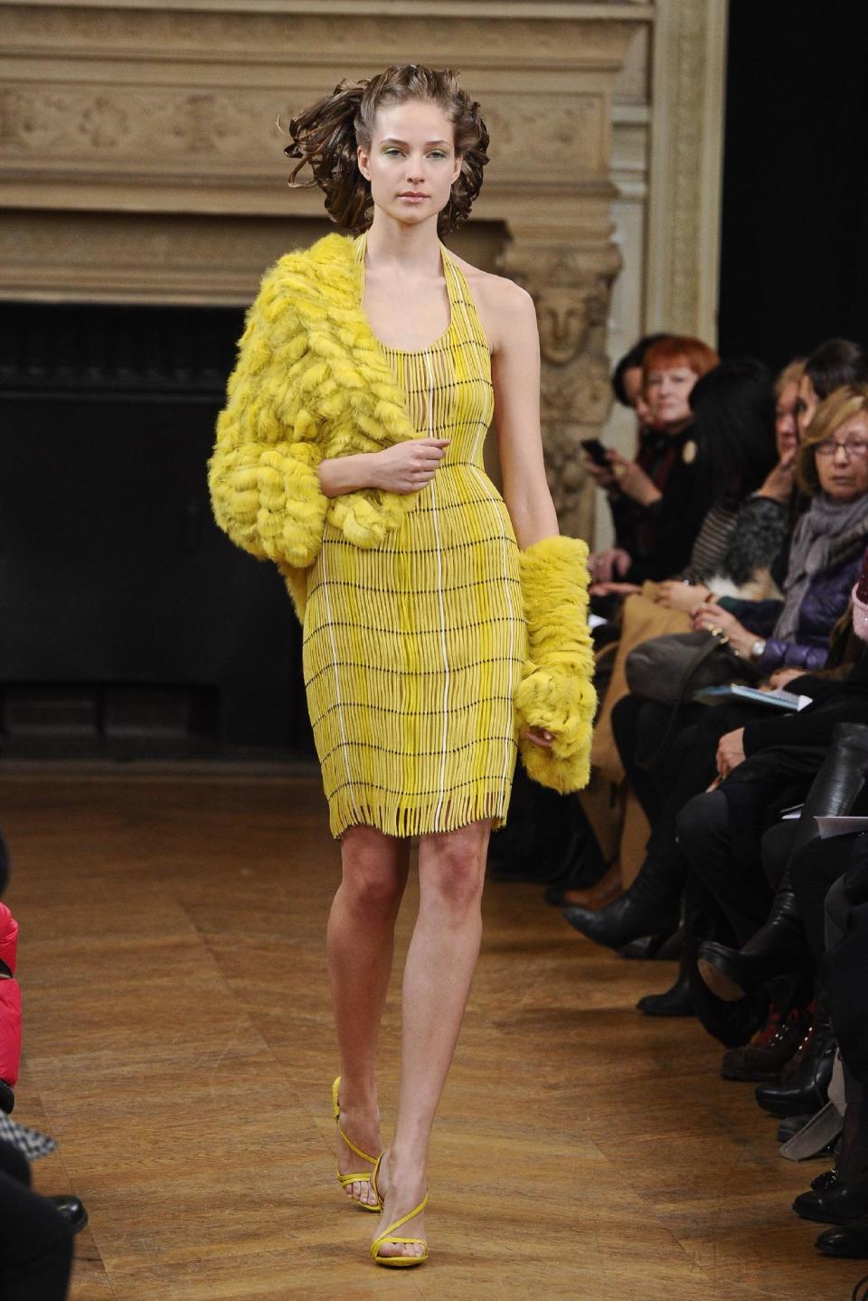 A model wears a creation by fashion designer Maurizio Galante as part of his Spring/Summer 2013 Haute Couture fashion collection, presented in Paris, Monday, Jan. 21, 2013. (AP Photo/Zacharie Scheurer)