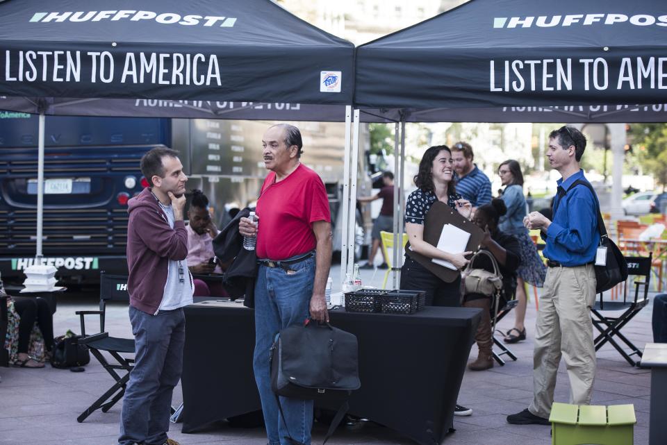 Adam Goldberg (left) speaks with Mace Williams during HuffPost's visit to Detroit.