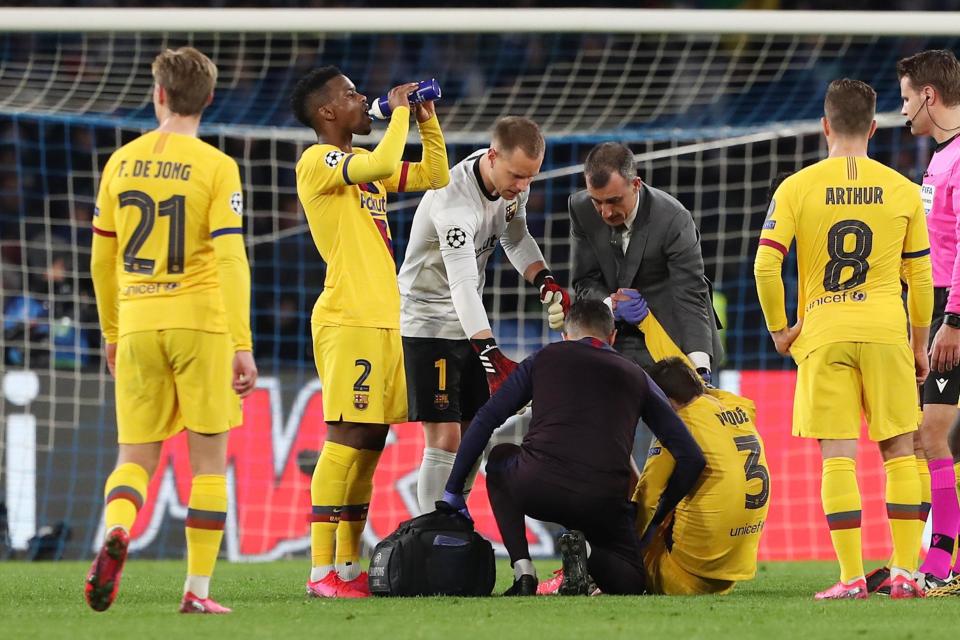 The visitors also lost Gerard Pique to injury on a testing night at the Stadio San Paolo (Getty Images)