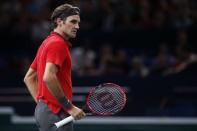 Switzerland's Roger Federer reacts during his men's singles tennis match against Lucas Pouille of France in the third round of the Paris Masters tennis tournament at the Bercy sports hall in Paris, October 30, 2014. REUTERS/Benoit Tessier