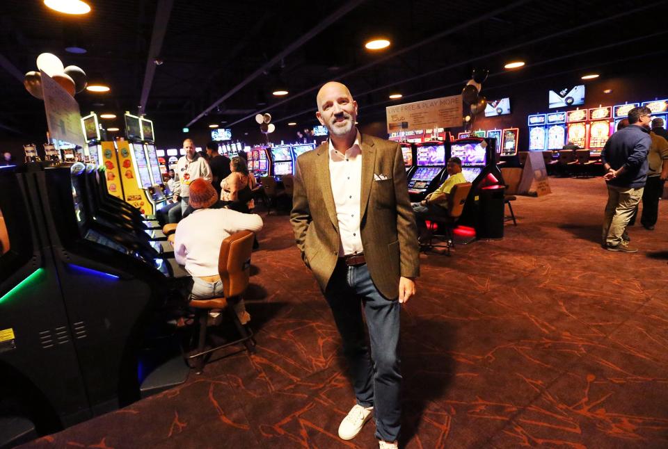 Andre Carrier shows off the latest additional game room at The Brook casino in Seabrook.