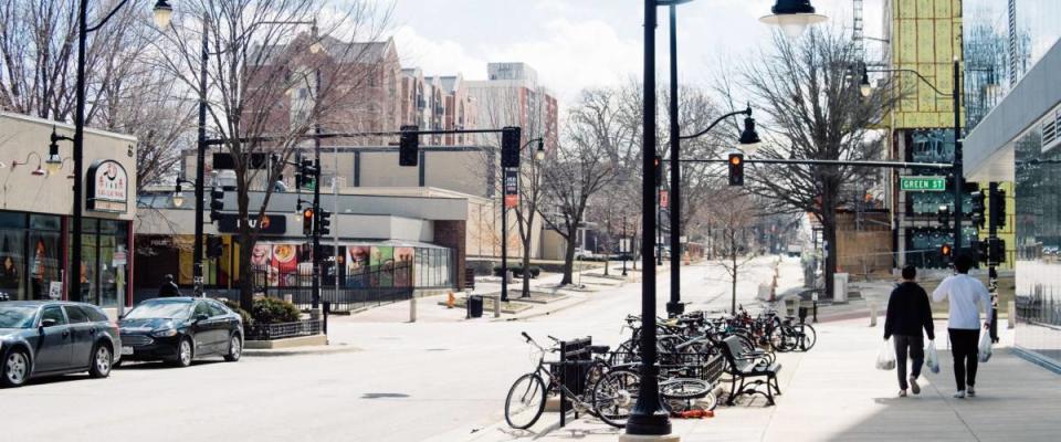 Green Street, Champaign, IllinoisMarch 18, 2019Asian students walk to the corner of Green Street in Campustown of University of Illinois at Urbana-Champaign on Spring Break