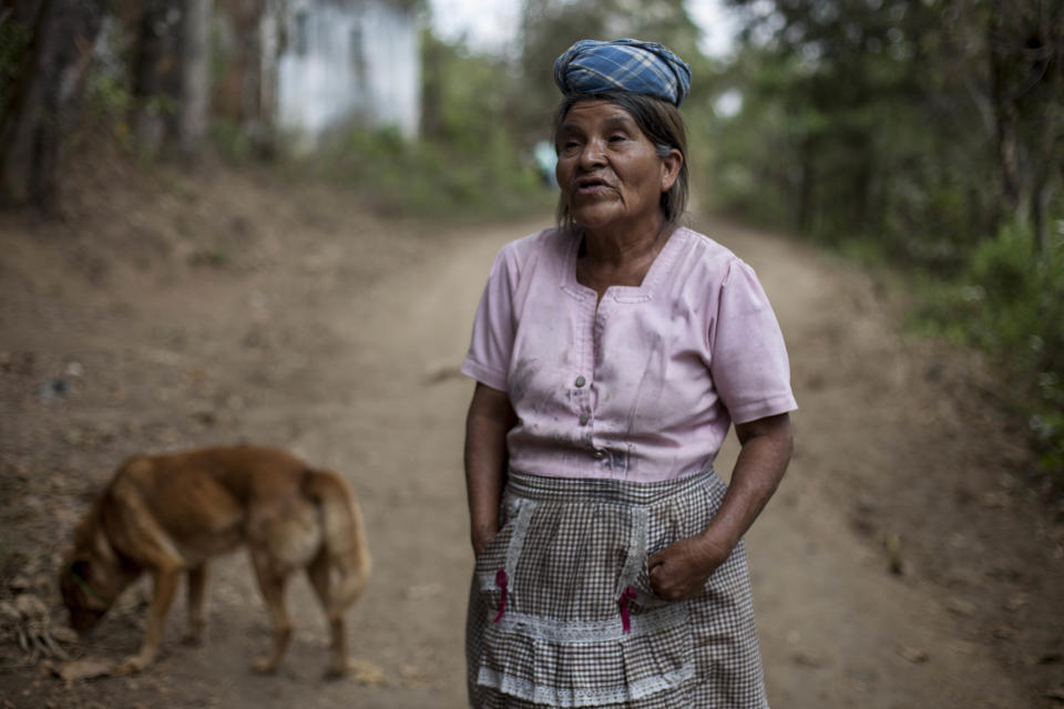 In this March 6, 2014 photo, Juana Tajtaj, 61, talks about the 1988 massacre of El Aguacate in San Andres Itzapa, Guatemala. Her husband Cristobal Chuy was one of the men who died in that massacre. In November 1988 in the mountainous area of western Guatemala, 22 men who lived in a village of El Aguacate where massacred by leftists guerillas during the Guatemalan civil war. The case will be taken to court on Thursday, March 13, 2014, in which more than 30 persons are expected to testify. (AP Photo/Luis Soto)