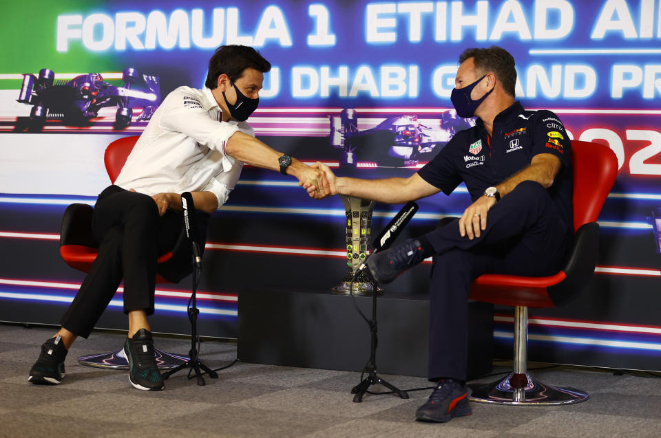 Mercedes GP Executive Director Toto Wolff (pictured left) and Red Bull Racing Team Principal Christian Horner (pictured right) shake hands.