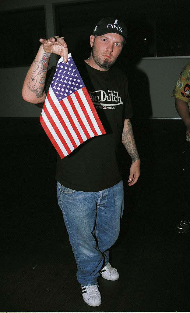 Fred holding a small U.S. flag