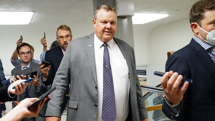 Sen. Jon Tester (D-Mont.) speaks to reporters regarding the bipartisan infrastructure negotiations as he arrives to the Capitol for a vote on Wednesday, July 21, 2021.